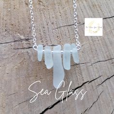 Beautiful and delicate genuine Cornish White Clear Sea Glass and 925 Sterling Silver handmade necklace pendant. The seaglass in this stunning piece was discovered on the beach at Port Isaac, and then secured with tiny Sterling Silver balls and Sterling Silver wire .  𝐏𝐚𝐜𝐤𝐚𝐠𝐢𝐧𝐠 𝐢𝐧𝐜𝐥𝐮𝐝𝐞𝐬 𝐚 𝐥𝐢𝐭𝐭𝐥𝐞 𝐦𝐚𝐩 𝐨𝐟 𝐂𝐨𝐫𝐧𝐰𝐚𝐥𝐥, 𝐬𝐡𝐨𝐰𝐢𝐧𝐠 𝐞𝐱𝐚𝐜𝐭𝐥𝐲 𝐰𝐡𝐞𝐫𝐞 𝐏𝐨𝐫𝐭 𝐈𝐬𝐚𝐚𝐜 𝐢𝐬 𝐰𝐡𝐞𝐫𝐞 𝐭𝐡𝐞 𝐬𝐞𝐚 𝐠𝐥𝐚𝐬𝐬 𝐢𝐧 𝐭𝐡𝐢𝐬 𝐢𝐭𝐞𝐦 𝐰𝐚𝐬 𝐟𝐨𝐮𝐧𝐝.  Sea g White Sea Glass Necklace As A Gift, Map Of Cornwall, Cornwall Map, Ocean-inspired Silver Glass Necklace, Clear Sea, Silver Sea Glass Necklace With Wire Wrapped Detail, Port Isaac, Adjustable Ocean-inspired Sea Glass Jewelry, Nickel-free Blue Sea Glass Jewelry