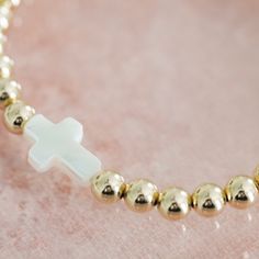 Some of the most lovely things are the most simple—and our Cross Bead Bracelet is no exception. A small white pearl cross, made with white pearl of the sea. Small 14k gold filled round beads, made with metal of the earth. These simple, natural materials find a home together in this piece, and in that harmony, you can find a powerful reminder: Christ gave His life for you. The Cross Bead Bracelet is the perfect addition to your favorite bracelet stack. We love this bracelet paired with our Marian Home Together, Necklace Extender, Local Jewelry, Lovely Things, Of The Earth, Bracelet Stack, Silver Roses, Silver Rose Gold, White Pearl