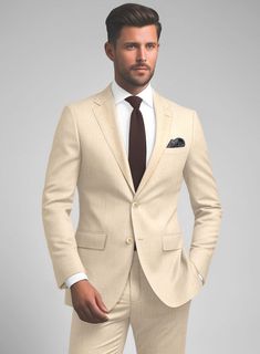 Discover the perfect blend of comfort, fashion, and classic sophistication with our stunning Noble Beige Wool Silk Linen Suit, designed to turn heads wherever you go. Made from a blend of wool, silk, and linen fabric, it promises to keep you cool and composed, even in the warmest settings. Its neutral beige color, presented in a smooth, solid design, provides a flexible backdrop for your unique style to shine through. Ideal for a radiant summer party, a romantic beach wedding, or making an impac Semi-formal Slim Fit Linen Suits, Classic Slim Fit Linen Suits, Cream Linen Suit For Semi-formal Occasions, Slim Fit Linen Suit With Notch Lapel, Slim Fit Linen Suits With Notch Lapel, Slim Fit Linen Suits For Business, Slim Fit Linen Business Suits, Elegant Beige Suits With Welt Pockets, Fitted Linen Suit With Pressed Crease