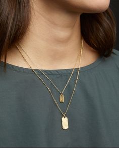 An engravable dog tag sits on an 18k gold plated, adjustable chain. Bespoke Dog Tag Necklace in 18k Gold, Women's by gorjana Earrings Stacking, Dog Tag Pendant, Black Labradorite, Tag Ideas, Orange Agate, 14k Gold Necklace, Mix Style, 925 Sterling Silver Chain, Ring Size Guide