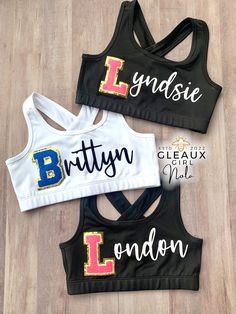 ✨Custom Initial with flock or glitter name.  ✨Please Specify Sports Bra Color  Options: Black, White, Hot Pink... Don't see your color? Inbox me✨ 1 Patch $30 2 Patches $34 3 Patches $38 1 Patch with Name Ending $34 All Star Cheer Gifts, Cheer Must Haves, Cheer Team Mom, Bring It On Cheer, Cute Cheer Gifts, Cheer Sports Bras, Comp Cheer, Sports Merch, Cheer Clothes