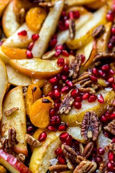 apples and pecans with pomegranates on top