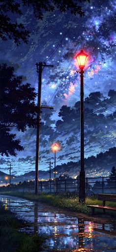 a street light sitting on the side of a road under a night sky filled with stars