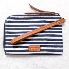 Fossil Eliza Wristlet In Navy Stripes. Brand New With Tags. Measures: 9” X 6”. Casual Everyday Clutch Wristlet, Casual Everyday Pouch Wristlet, Casual Wristlet With Zipper Closure For Everyday Use, Casual Everyday Wristlet With Zipper Closure, Casual Wristlet With Zipper Closure, Brown Clutch, Clutch Purse Black, Leather Card Holder Wallet, Fossil Purse