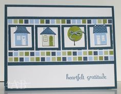 a handmade card with some houses and a tree on the front that says, heartful gratiule