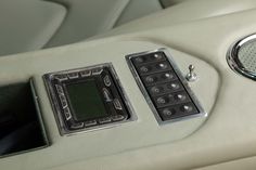 the interior of a car with buttons and controls