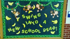 a bulletin board with monkeys and bananas hanging from it's sides that says swing like a new school year