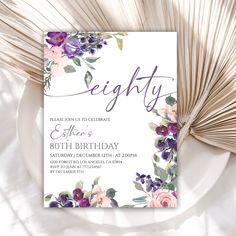 an elegant floral birthday party card on a plate