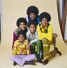 the jacksons are posing for a photo together