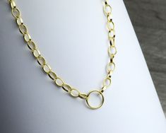 "Our gold vermeil charm necklace is sure to become your go-to accessory to add style and elegance to any look. The oval-shaped, solid links are timeless and luxurious. Simply clasp your gorgeous charms onto the center ring of this necklace to showcase your personal style. Our easy lobster clasp makes this necklace a breeze to put on and take off. Finish is 18k gold vermeil and base material is 100% solid 925 sterling silver. The vermeil gold finish is 5 times thicker than regular gold plating an Chunky Pendant Necklace, Thick Gold Chain Necklace, Chunky Pendant, Long Pearl Necklace, Thick Gold Chain, Pendant Necklace Long, Sterling Silver Charm Necklace, Charm Holder, Long Pearl Necklaces