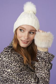 A must have for this winter season, this exquisite knitted beanie faux fur pom pom hat is a wardrobe essential piece for everyday wear. Easily combined with your favourite outfit because of it's versatility and muted colour.  Knitted Faux Fur Pom Pom Hat Muted Colour, Fur Pom Pom Hat, Faux Fur Bag, Fur Gloves, Fur Headband, Faux Fur Hat, Faux Fur Scarves, Cashmere Gloves, Feather Hat