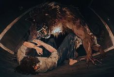 a man laying on the ground next to a demon