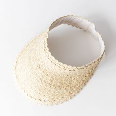 Keep the sun off your face this summer with a handwoven visor made by artisans in Bali! Great for beach or pool days with a braid or messy bun. Ethically made/Eco-friendly Made with palm leaves Elastic band One size fits most 11"x9" Lightweight Straw Hat For Vacation, Natural Woven Sun Hat For Vacation, Eco-friendly Woven Sun Hat For Spring, Adjustable Straw Hat For Sunbathing At Beach, Adjustable Straw Hat For Sunbathing On Vacation, Adjustable Straw Hat For Beach Season Sunbathing, Adjustable Straw Sun Hat For Poolside, Adjustable Straw Hat For Vacation Sunbathing, Straw Sun Hat For Summer, One Size