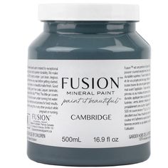 a bottle of fuson mineral paint in dark blue, with white cap on the top