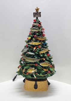 a small christmas tree with fish on it