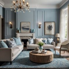 a living room filled with furniture and a chandelier above a fire place in front of a fireplace