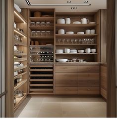 a kitchen with wooden cabinets and shelves filled with dishes