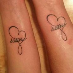 two small tattoos that say sister and sister