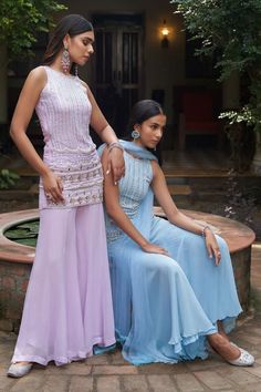 Lavender sleeveless halter neck kurta with vine embroidery using pearl and sequin highlights. Paired with a flared sharara and dupatta with glass beads tassels on the borders. - Aza Fashions Sleeveless Wedding Dress For Eid, Sleeveless Georgette Dress For Eid, Sleeveless Party Dress For Eid, Eid Sets With Sheer Dupatta Sleeveless, Fitted Sleeveless Dress For Eid, Elegant Sleeveless Sets For Eid, Sleeveless Palazzo Set With Sheer Dupatta For Party, Bollywood Style Sleeveless Eid Dresses, Bollywood Sleeveless Eid Dresses