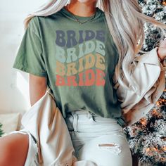 Retro Bachelorette Party Shirt, Retro Bride Shirt, Bachelorette Party Tee, Bride Tee, Bridal Party Tops What a great way to celebrate your day! Grab coordinating bachelorette shirts for a night out or in. These shirts feature retro text for the bride or her tribe. These shirts are fashionable and comfortable. SIZING: These shirts are UNISEX. Since different manufacturers cut differently, we very strongly recommend using the measurement chart provided in the picture section to make sure you order Retro Bachelorette Shirts, 70s Bachelorette Party Shirts, Bride To Be Tshirt, Bride And Babe Shirt, Bride Squad Shirt, Bachelorette Party Tees, Bride Tshirt, Bride Tee, Retro Bride