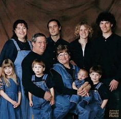 the family is posing for a photo together