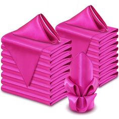 a stack of bright pink napkins with a bow on the front and one in the back