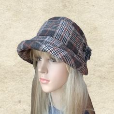 This cloche hat has a wide brim. The brim can be turned up or turned down. It's easy to take shape you want. It is an elegant accessory for many occasions. One size fits most (21 - 22 inches) This hat can be flat packed for suitcases or handbags . Hand wash and lay flat to dry. NOTE Actual color may slightly different depending on your monitor. Winter Brimmed Cloche Hat One Size, Winter Brimmed Cloche Hat, Warm Short Brim Cloche Hat For Winter, One Size Wide Brim Cloche Hat For Fall, Winter Wide Brim Bucket Hat One Size, Winter Wide Brim Bucket Hat, One Size Fall Wide Brim Cloche Hat, Fall Wide Brim Cloche Hat, Adjustable Warm Hats