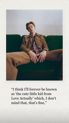 a man sitting on top of a green couch next to a quote from the book i think i'll forever be known as the cute little kid from love actually which, i don'm