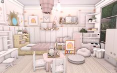 a room filled with lots of white furniture and decor on top of wooden flooring