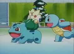 two pokemons are playing with each other in an ice rink while another looks on