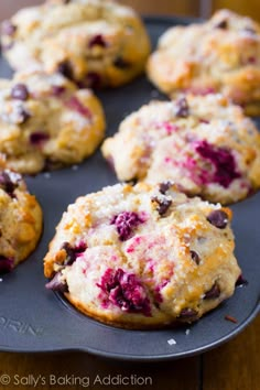 freshly baked blueberry muffins on a baking tray