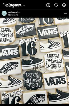 some cookies that are decorated to look like vans and the number one is on them