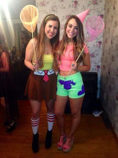 two girls in costume posing for the camera