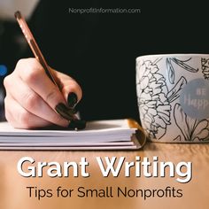 a person writing on top of a notebook next to a coffee cup and pen with the words grant writing tips for small non profits