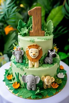 25 1st Birthday Cake Ideas for Your Little One's Big Day Jungle Theme Cake Design, Cake For One Year Old Boy, Wild One Birthday Party Cake, Wild One Cake Ideas, Jungle Theme Birthday Cake, First Birthday Boy Cake, 1st Birthday Cake Ideas, Animal Theme Cake, 1st Birthday Cake Designs