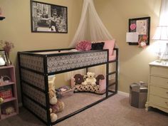 a child's bedroom with a bunk bed and stuffed animals on the bottom shelf