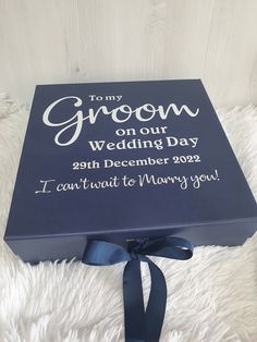 a blue box with the words to my groom on our wedding day