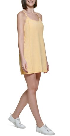 Hit the tennis courts or run errands in this tank dress from Calvin Klein| Pair this versatile design with sneakers for a chic workout ready look| Exercise Dress, Tennis Courts, Dress Yellow, Calvin Klein Woman, Yellow Dress, Tank Dress, Calvin Klein, Tennis, Yellow