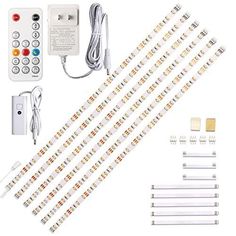 the kit includes several different types of lights and cords, including two remote controls, one for