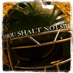 a helmet with the words thou shalt not steal written on it's side