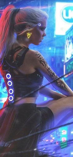 a woman with tattoos and neon lights on her body