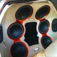 the inside of a car with speakers in it