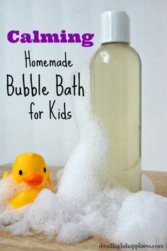 a bottle of bubble bath next to a rubber duck