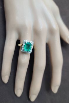 Gorgeous vintage 18K yellow gold engagement ring Gem green Colombia emerald. Center set treated green Colombia emerald in emerald shape weight 2.52ct. size 9x7mm very nice rich vivid green color nice luster, lively ,nice cut,Sparkly emerald and clean. side set round natural diamonds total weight 0.75ct. SI1-G Gorgeous setting ring solid gold Ring size 5 Resizable Retail Value $9,500 net. Appraisal available Green Emerald Cut Diamond Ring, Green Emerald Cut Ring With Halo Setting, Green Wedding Ring With Emerald Cut And Center Stone, Vintage Platinum Rings, Platinum Engagement Rings Vintage, Emerald Band, Emerald Ring Vintage, Filigree Engagement Ring, Sparkling Rings