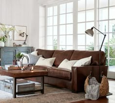 a living room filled with furniture and decor for spring refreshent 20 % off + free shipping on your order