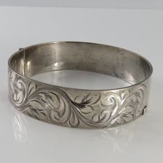 Estate victorian bangle bracelet. silver plate great shape. hallmarked. 15.41mm wide. 24.8 grams. 1900's Luxury Traditional Antique Silver Bracelet, Luxury Victorian Sterling Silver Bracelet, Luxury Victorian Bangle For Anniversary, Vintage Engraved Bracelets For Wedding, Vintage Hinged Bracelets For Wedding, Silver Infinity Ring, Silver Ornaments, Victorian Gold, All Gems