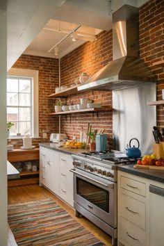 A small kitchen featuring a brick backsplash that adds warmth to the compact space. Backsplash Inspiration, Future Inspiration, Exposed Brick Walls, Compact Kitchen