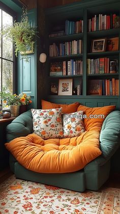 a living room filled with lots of books and furniture