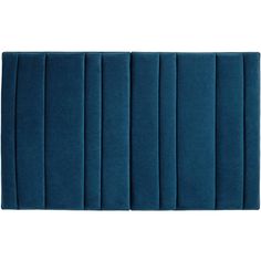 the back side of a blue bath mat with pleated lines on top and bottom