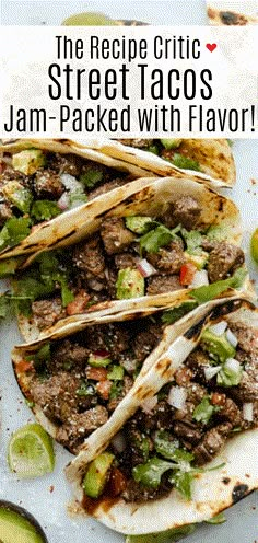 three steak tacos with jalapenos and avocado on the side